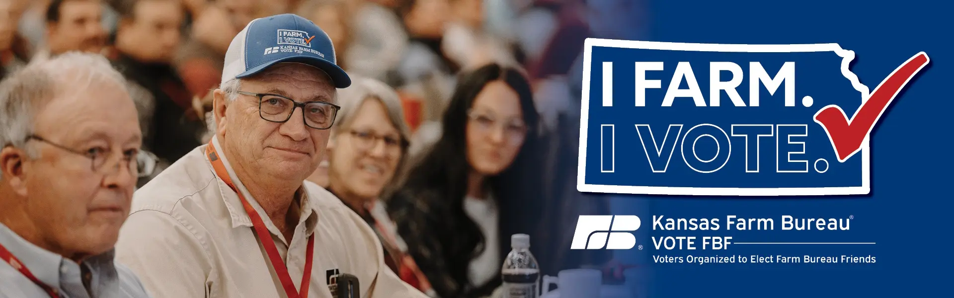 Kansas Farm Bureau member attending the annual meeting, with I Farm I Vote logo to the right